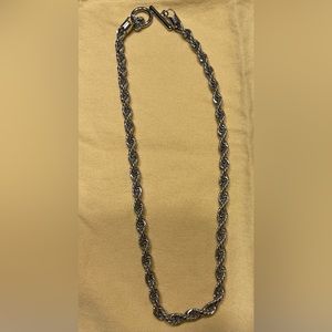 silver rope-like necklace